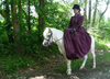 The star of the show, Topsy, being ridden sidesaddle by the Duchess of Cleveland.
